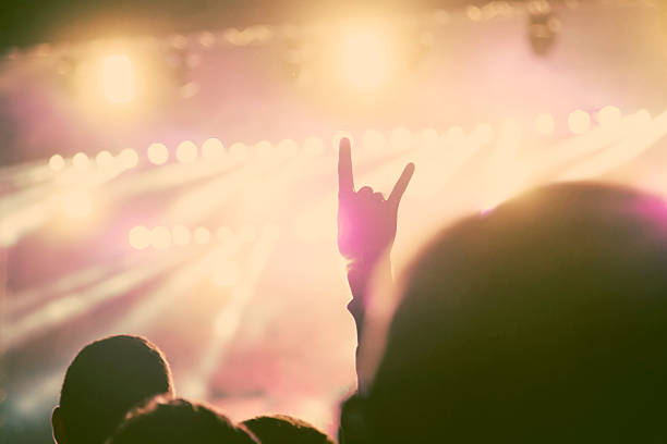 istock Crowd at concert - retro style photo 476611432