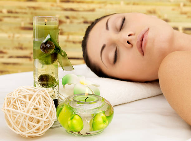 istock Relaxing woman at beauty spa salon 476611607