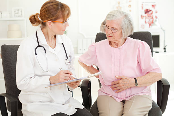 istock Senior woman visiting doctor. 476614444