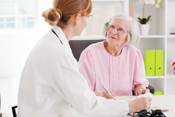 istock Senior couple visiting doctor. 476614510