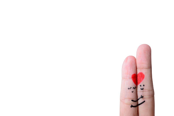 istock happy couple in love with painted smiley and hugging 476614773