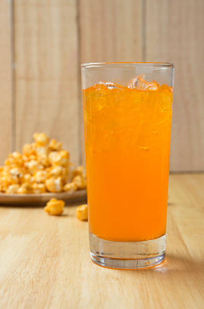 istock Refreshing Orange Soda with Ice and Popcorn 476617720