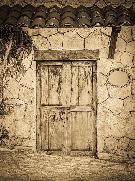 Vintage style old locked colonial doors of mexican hacienda