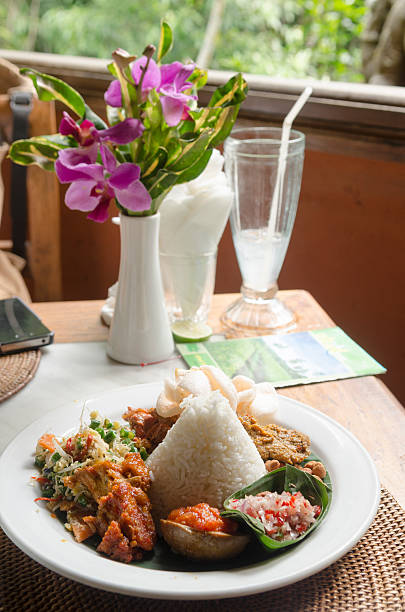 istock nasi lemack style dish fresh vegetables and fish with rice 476628118