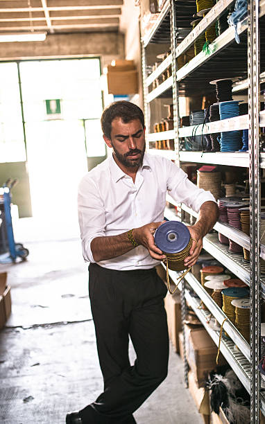 istock Industrial owner inside his factory 476628960