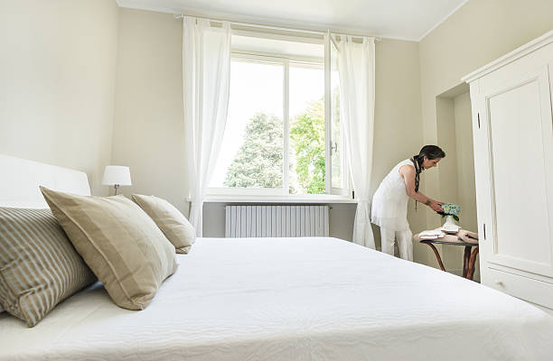 istock Woman relaxing inside her beautiful bedroom 476629216