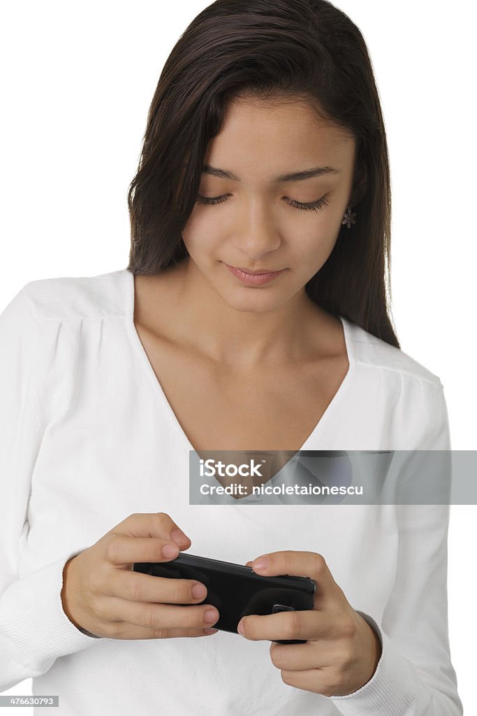 Girl Looking at smartphone - Foto de stock de Adolescencia libre de derechos