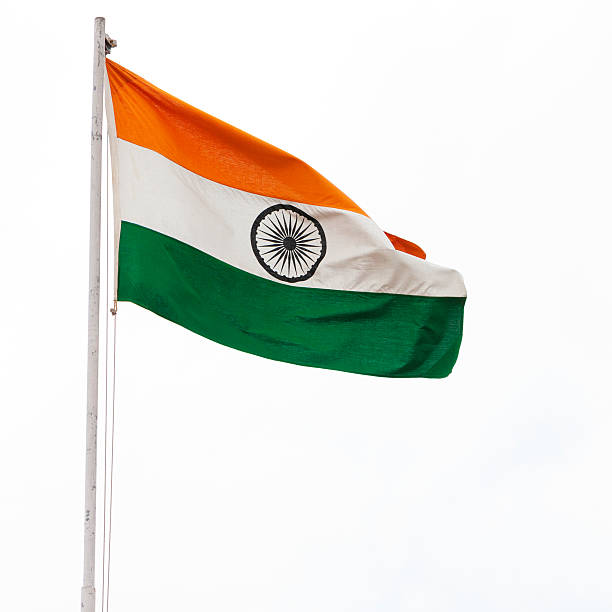 флаг индии, развевающихся на ветру - indian flag стоковые фото и изображения