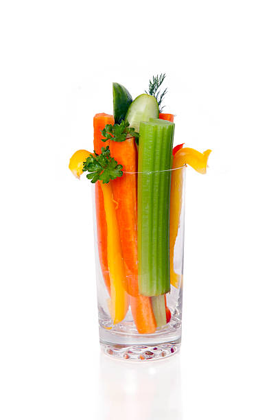 istock The glass with cut fresh vegetables 476631906