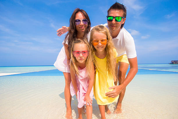 istock Beautiful family during summer tropical vacation 476632192
