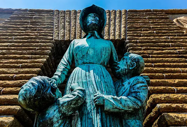 Voortrekker woman and children monument. The Voortrekker Monument is located just south of Pretoria in South Africa. This massive granite structure is prominently located on a hilltop, and was raised to commemorate the Voortrekkers who left the Cape Colony between 1835 and 1854.