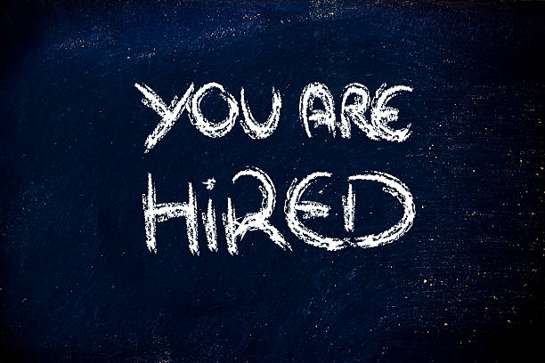 istock you're hired message on chalkboard 476641326