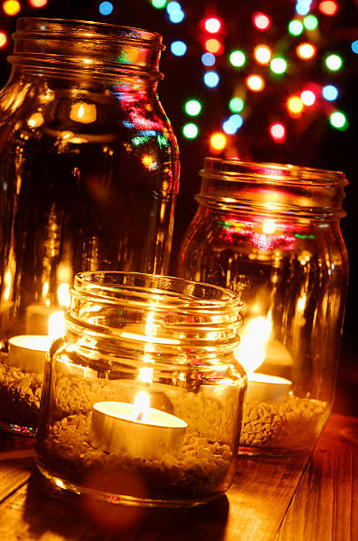 istock Candles Inside Jars With Christmas Lights 476653228