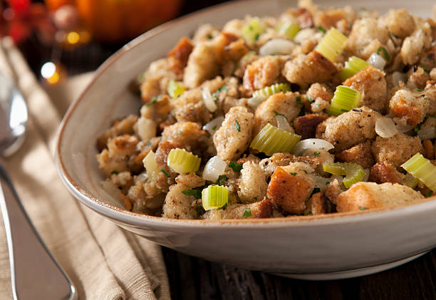 riempimento del ringraziamento - stuffing celery onion spoon foto e immagini stock