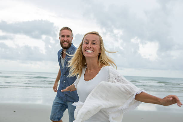 istock Happiness and freedom-Couple on beach 476659198