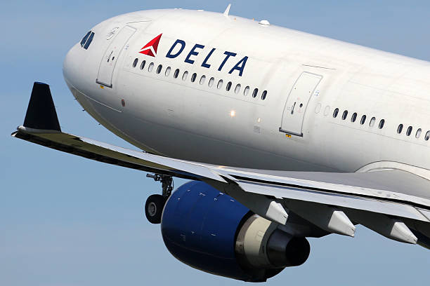 Delta Air Lines Airbus A330-300 airplane Amsterdam, Netherlands - April 21, 2015: A Delta Air Lines Airbus A330-300 with the registration N808NW takes off from Amsterdam Airport (AMS) in the Netherlands. Delta is one out of the three major American legacy carriers with its headquarters in Atlanta. delta stock pictures, royalty-free photos & images