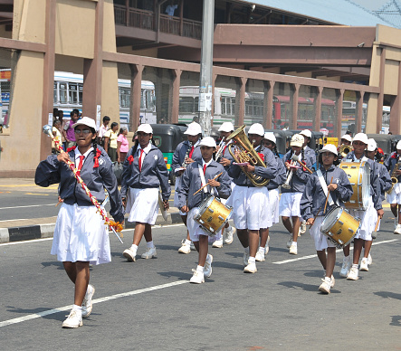 Hikkaduwa, Sri Lanka - February 1, 2012: Hundreds of unidentified school children marching in the Victory Day in Hikkaduwa, Sri Lanka.