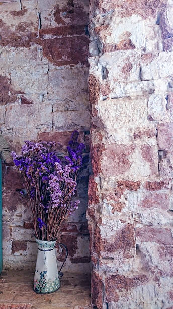 istock Vintage brick background with dry lavandula 476666510