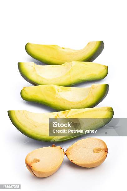 Foto de Fatias De Abacate e mais fotos de stock de Abacate - Abacate, Alimentação Saudável, Amarelo