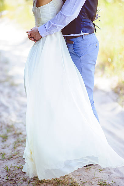 istock Just married couple embrace outdoor 476669280