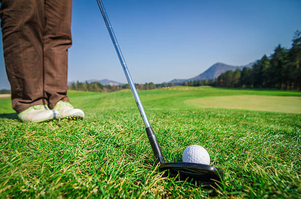 istock Golfer is chipping a golf ball onto the green 476669398