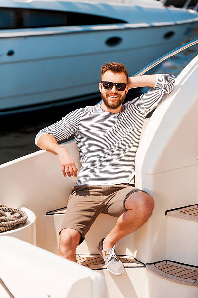 istock Happy time on his yacht. 476670166