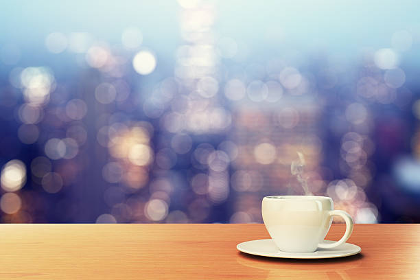 istock cup of coffee on a wooden table in a cafe 476670418