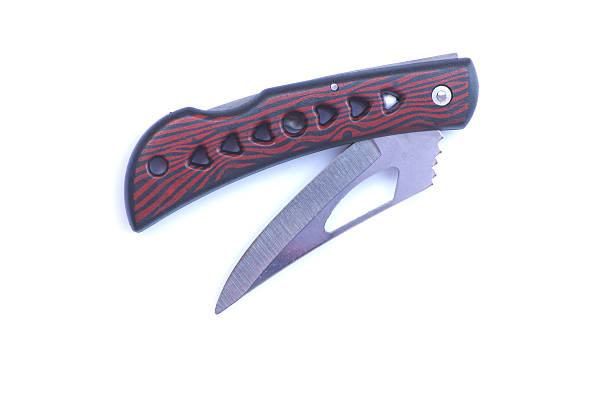istock Isolated pocket knife and a dark wooden handle 476671673