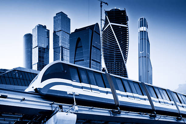 istock Skyscrapers and monorail train. Blue toned image 476671897