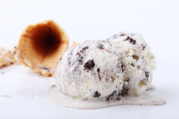 istock homemade cookie and cream ice cream scoop melt 476672704