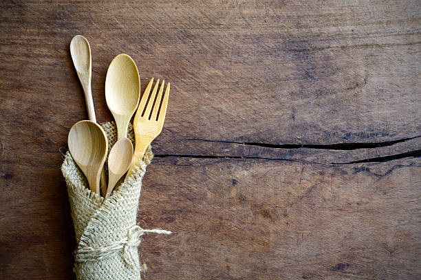 istock Set of wood spoon and fork on wooden table 476672796