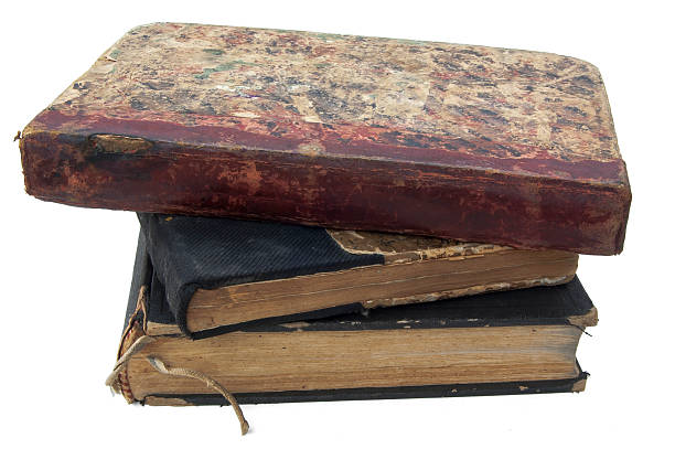 istock Pile of antique books isolated 476672946