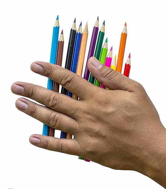 istock Pencils in hand on white background 476677748
