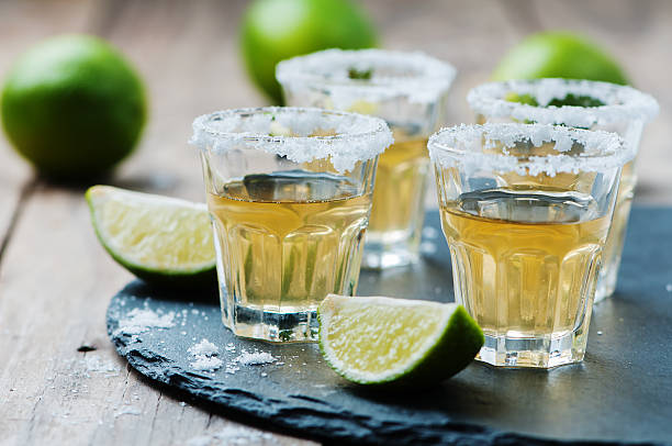 istock Gold tequila with lime and salt 476678342