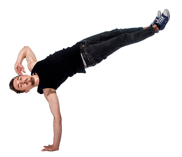 istock Break dancer doing one handed handstand against a white background 476679004