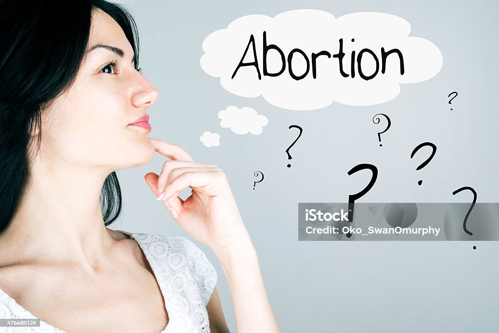 Abortion Woman thinking about abortion. Abortion Stock Photo