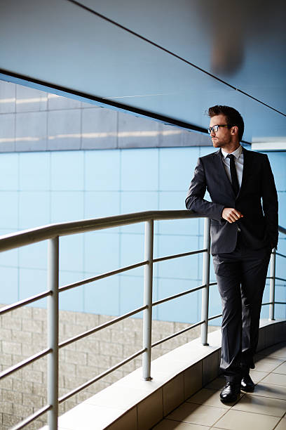 istock Businessman by railings 476683140