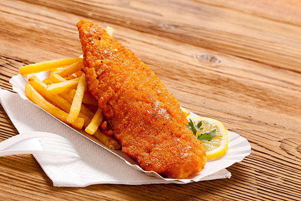 istock Fried fish and chips on a paper tray 476683854