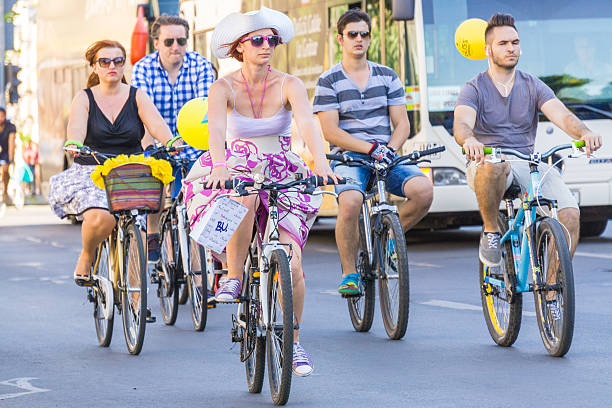 Bucharest, Romania - June 7, 2015: Group of people on bikes at Skirt Bike event. At his 6th edition is an annual event organised for women to encourage the use of bikes in the city and to celebrate the independence that cycling can provide as an alternative transportation.