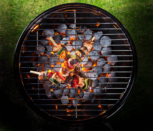 istock Delicious skewers on garden grill 476684848