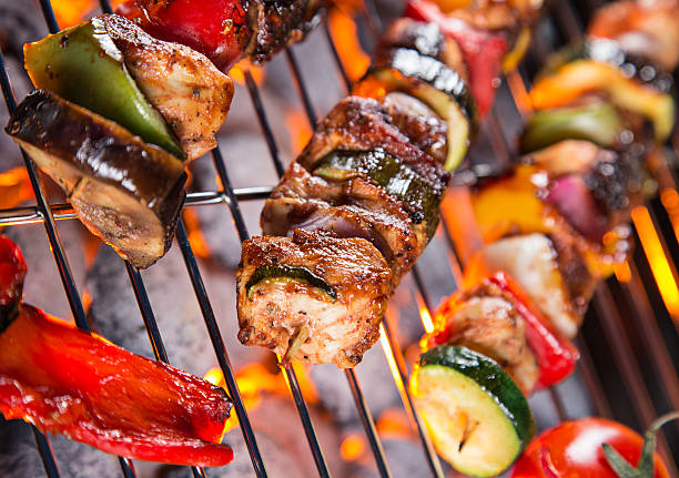 istock Delicious skewers on garden grill 476684852