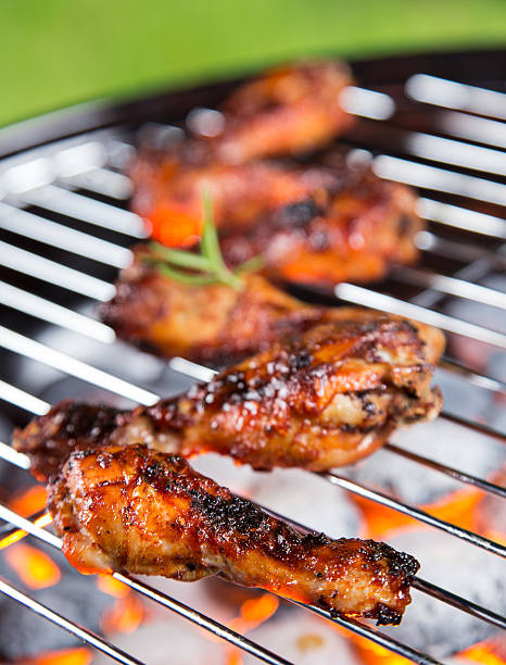 istock Delicious chicken legs on garden grill 476684914