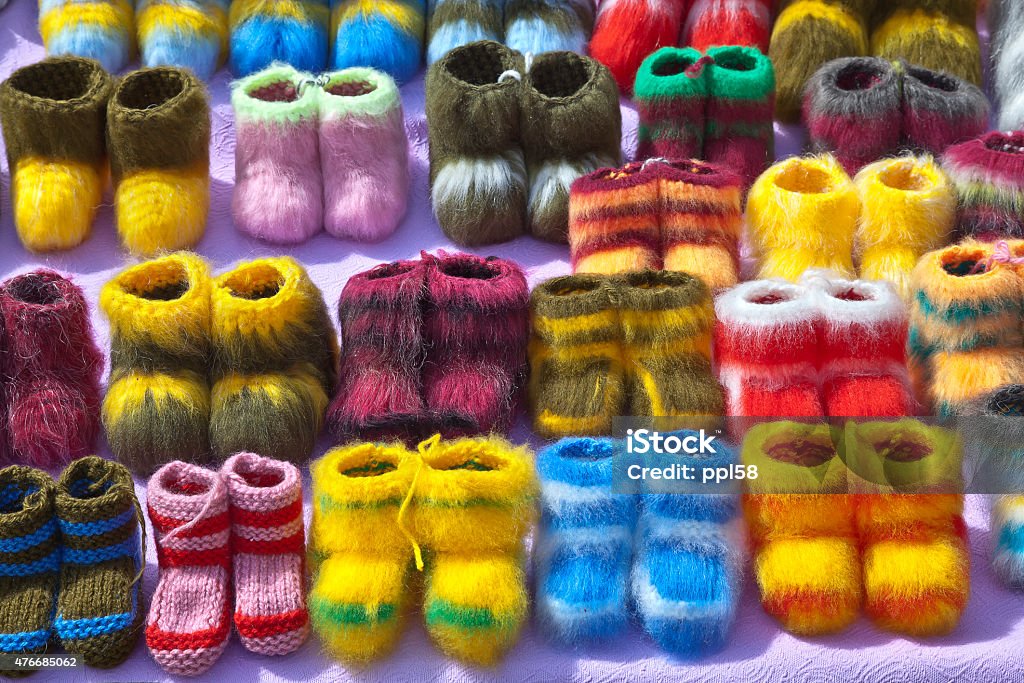 Bootee Sale of varicoloured beautiful bright  warm child's shoe 2015 Stock Photo