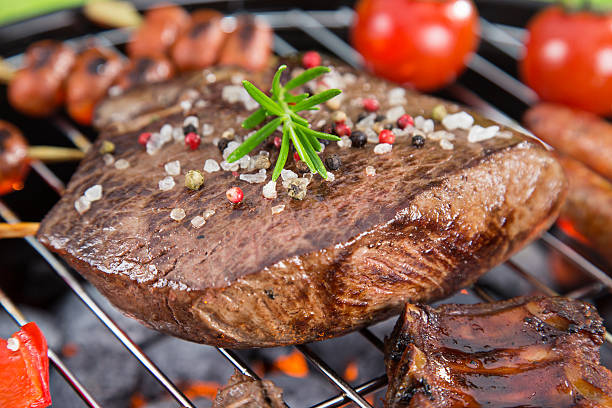 istock Beef steak on garden grill 476685560