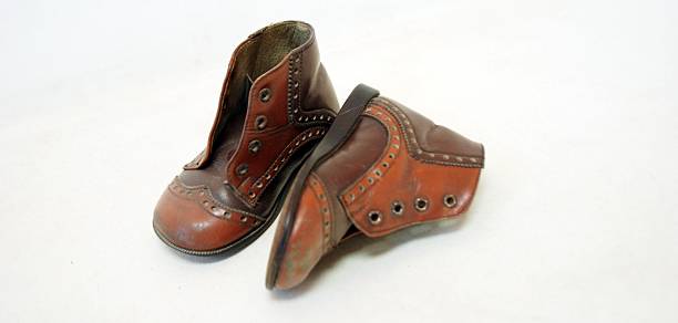 istock Old child shoes from 1971 476685720