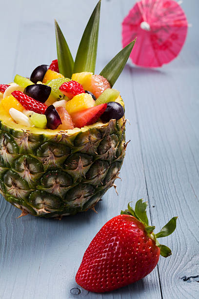 istock Fresh fruit salad served in bowls with fresh pineapple 476685812