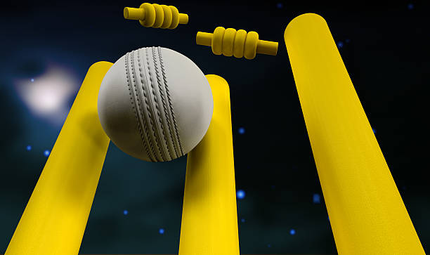 istock Cricket Ball Hitting Wickets Night 476687547