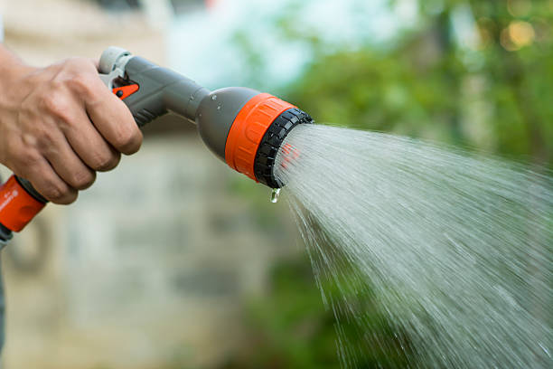 istock watering the garden 476689244