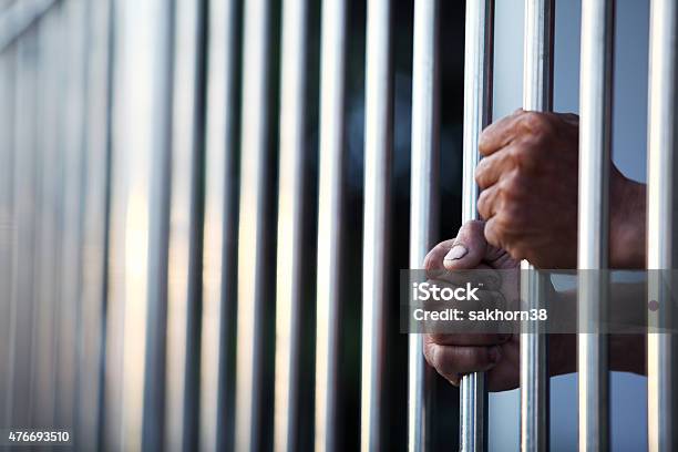 Hand In Jail Stock Photo - Download Image Now - 2015, Adult, Arrest