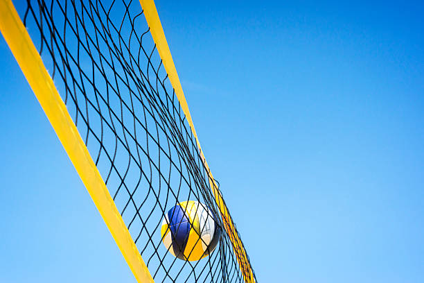 istock Beachvolley ball caught in net 476695332